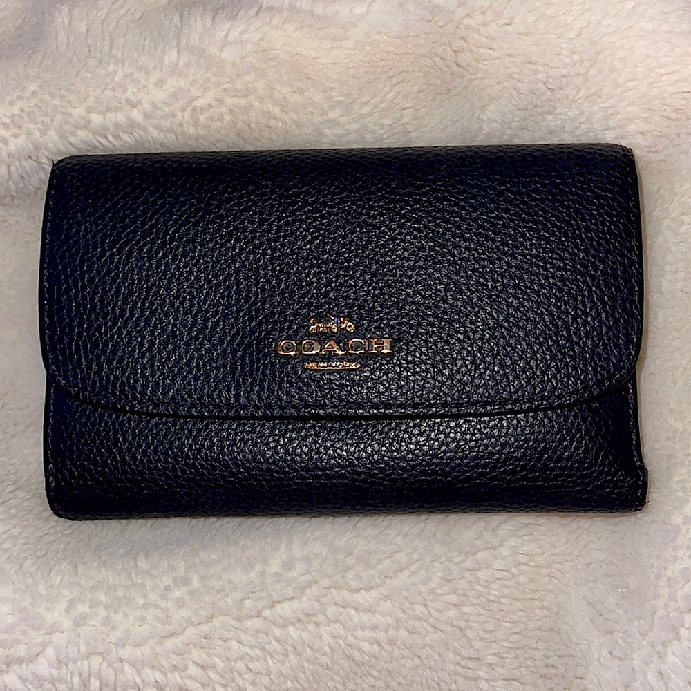 Coach tri-fold wallet. 4 card slots, zipper pouch. Lots of storage. Navy.